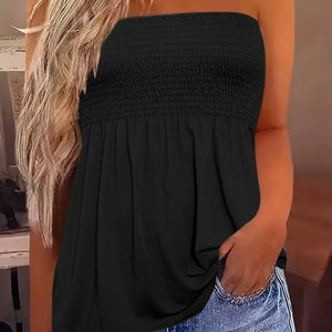The solid-colored top is off-the-shoulder and strapless