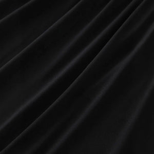 The solid-colored top is off-the-shoulder and strapless