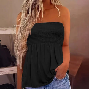 The solid-colored top is off-the-shoulder and strapless